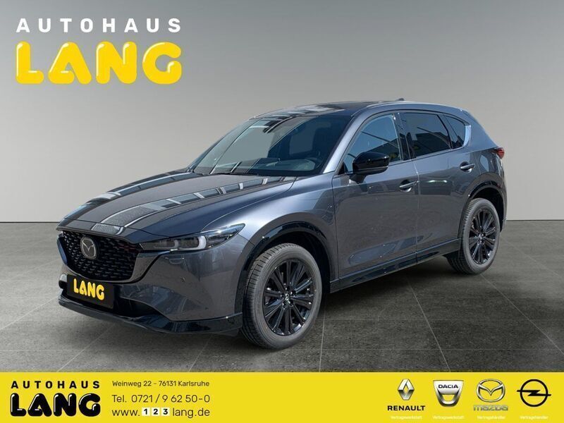 Machine gray (metallic) Gebraucht 2024 Mazda CX-5 Homura-Line SUV | 37.890 € (Fairer Preis) - Bild 1/4