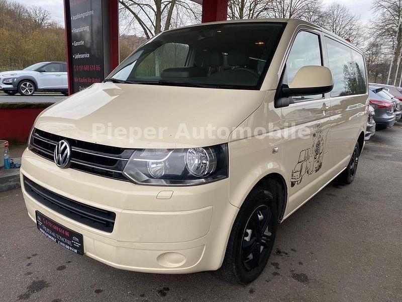 Gelb Gebraucht 2013 VW Caravelle Comfortline Van / Kleinbus | 9.290 € (Guter Preis) - Bild 1/4