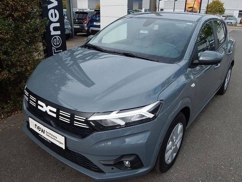 Schiefergrau Gebraucht 2024 Dacia Sandero Expression Kleinwagen | 16.760 € (Guter Preis) - Bild 1/4