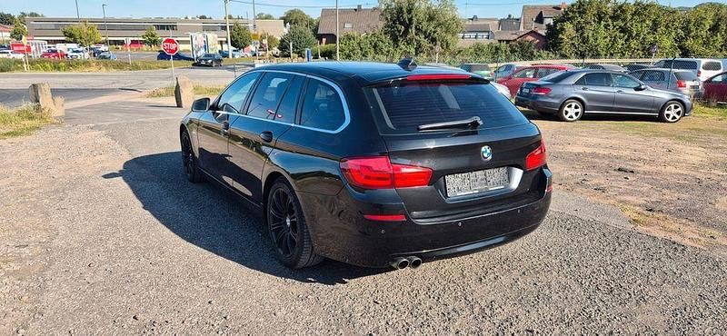 Gebraucht BMW 520 184 PS (135 kW) 2011 Schwarz Kombi