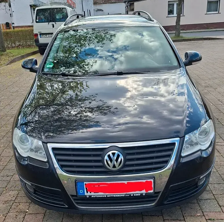 Second-hand VW Passat Sportline 160 CP (117 kW) 2009 Negru Break