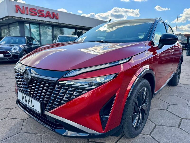 Fuji sunset red Gebraucht 2024 Nissan Qashqai 360º SUV | 34.990 € (Teuer) - Bild 1/4