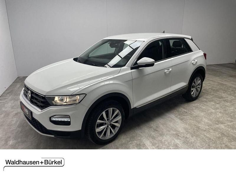 Pure white (metallic) Gebraucht 2021 VW T-Roc Style SUV | 18.950 € (Fairer Preis) - Bild 1/4