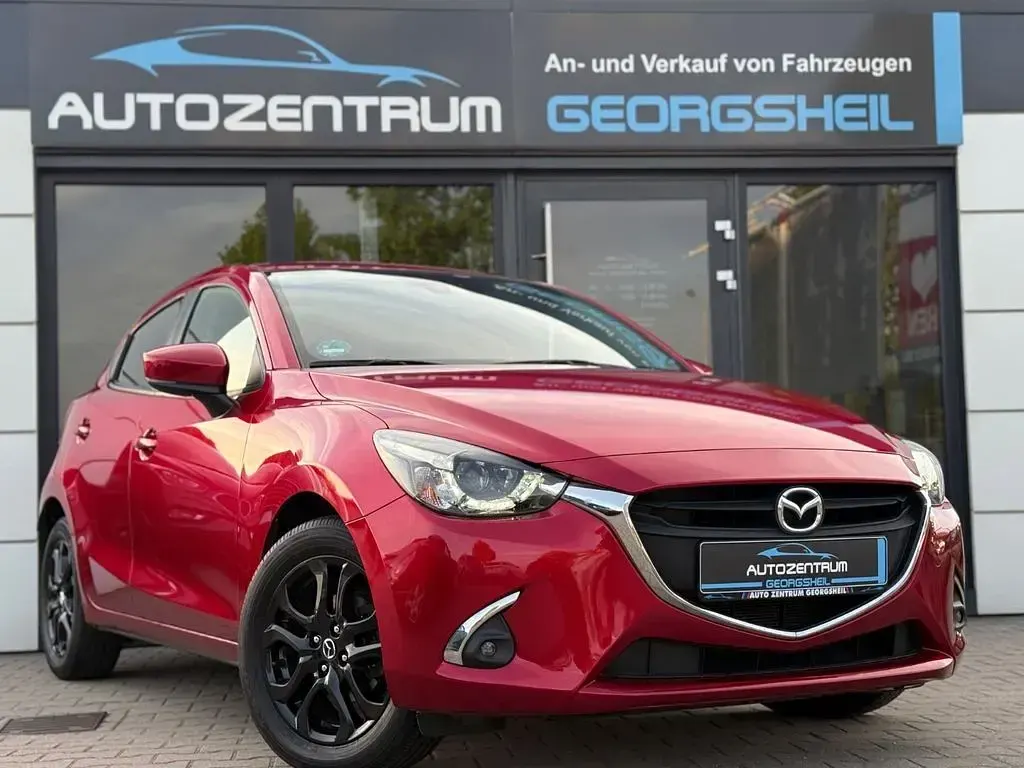 Używany Mazda 2 90 KM (66 kW) 2018 Czerwony Sedan/Limuzyna
