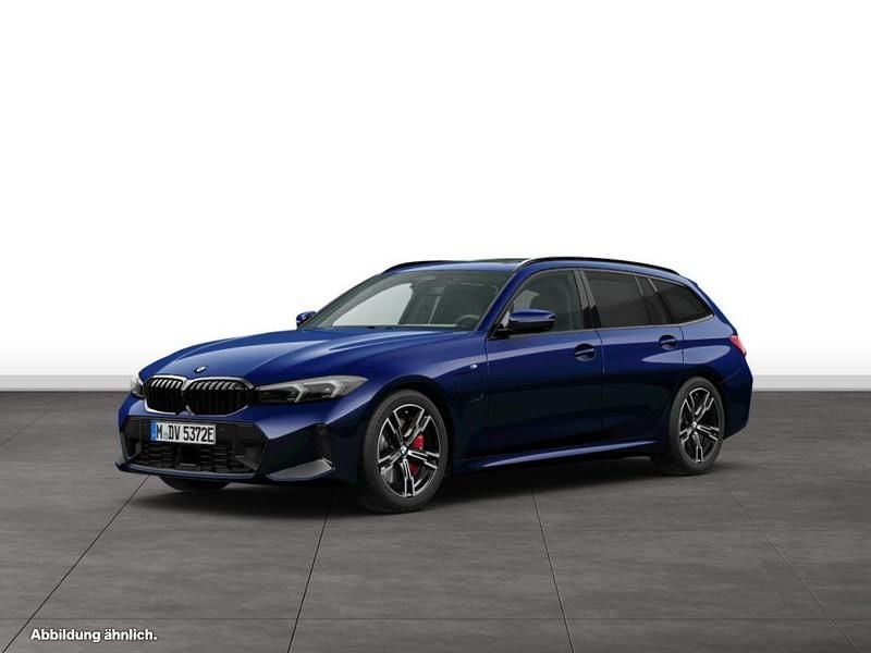 Blau Gebraucht 2024 BMW 330e Kombi | 59.276 € - Bild 1/3