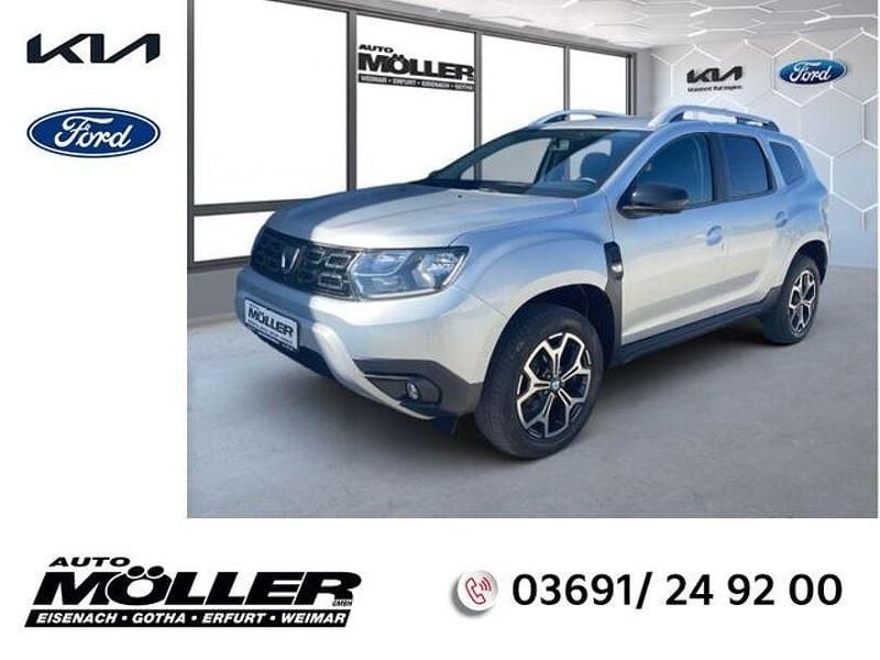 Grau Gebraucht 2021 Dacia Duster Celebration SUV | 15.790 € (Fairer Preis) - Bild 1/4