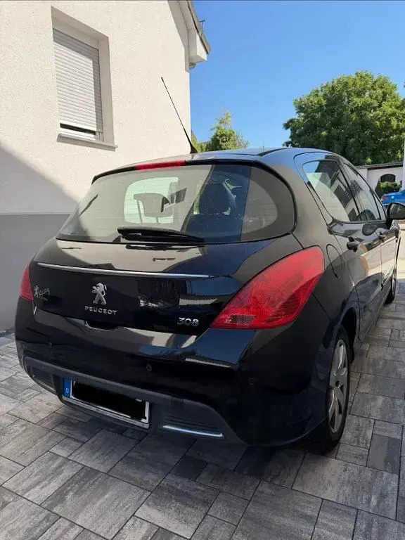 Gebraucht Peugeot 308 Style 120 PS (88 kW) 2013 Schwarz Limousine