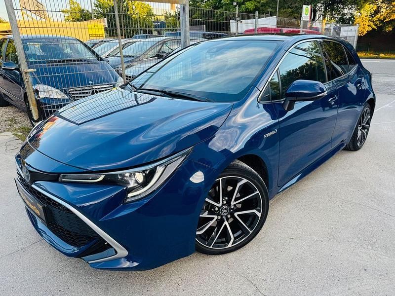 Blau Gebraucht 2019 Toyota Corolla Hybrid Lounge Limousine | 19.900 € - Bild 1/4