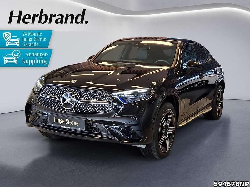 Gebraucht Mercedes GLC300e AMG 333 PS (244 kW) 2024 Metalliclack obsidianschwarz Coupé