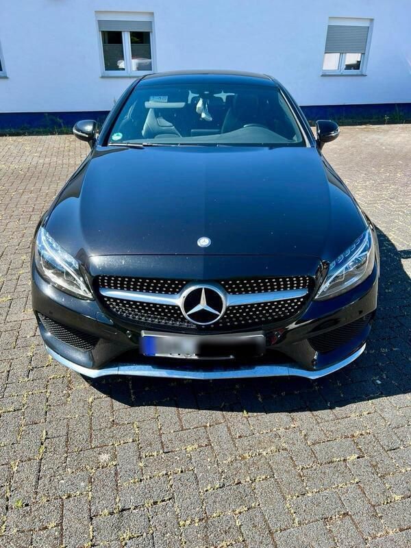 Schwarz Gebraucht 2016 Mercedes C200 AMG line Coupé | 24.000 € - Bild 1/4