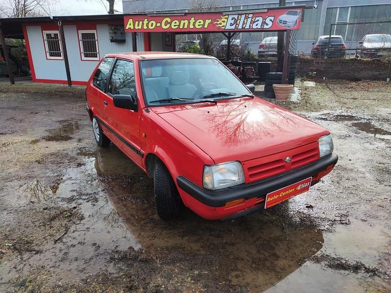 Rot Gebraucht 1990 Nissan Micra Kleinwagen | 1.749 € - Bild 1/4
