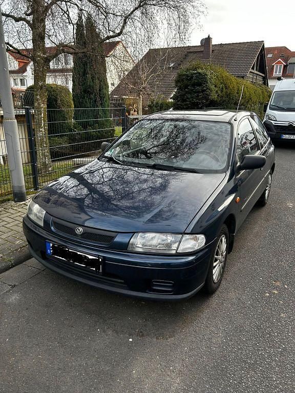 Gebraucht Mazda 323C 88 PS (64 kW) 1996 Blau Kleinwagen