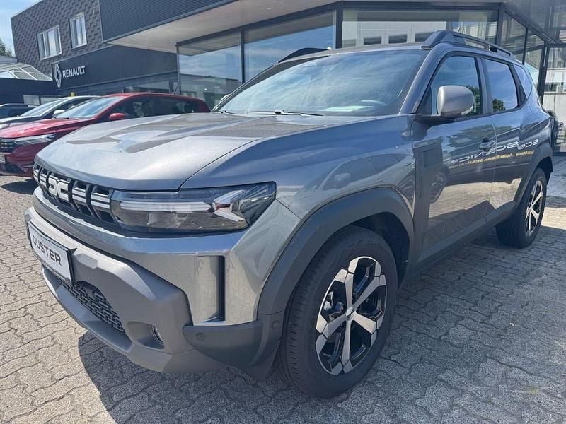 Grau Neu 2025 Dacia Duster Journey SUV | 30.425 € (Etwas zu teuer) - Bild 1/4