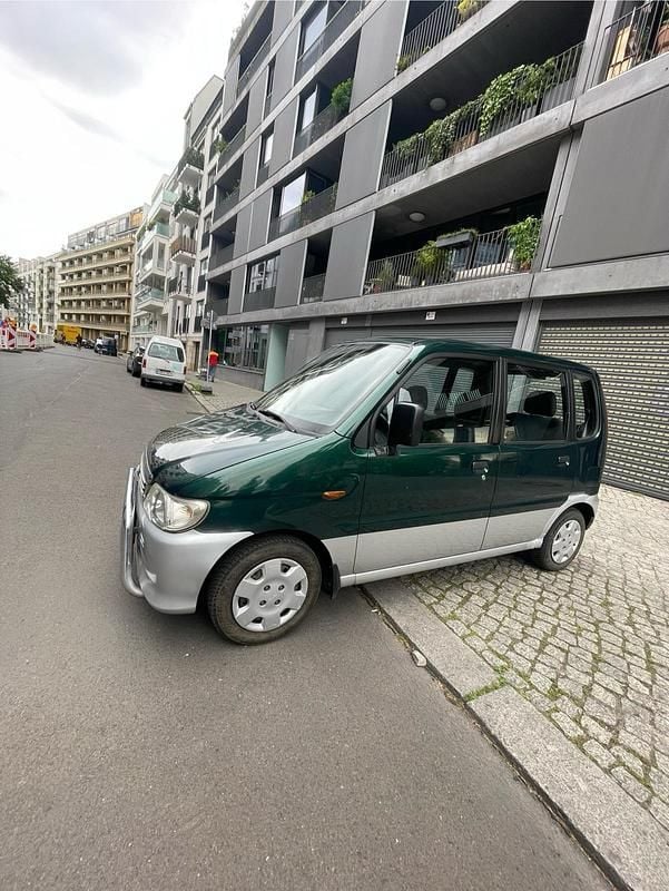 Grün Gebraucht 2003 Daihatsu Move Kleinwagen | 2.399 € - Bild 1/4