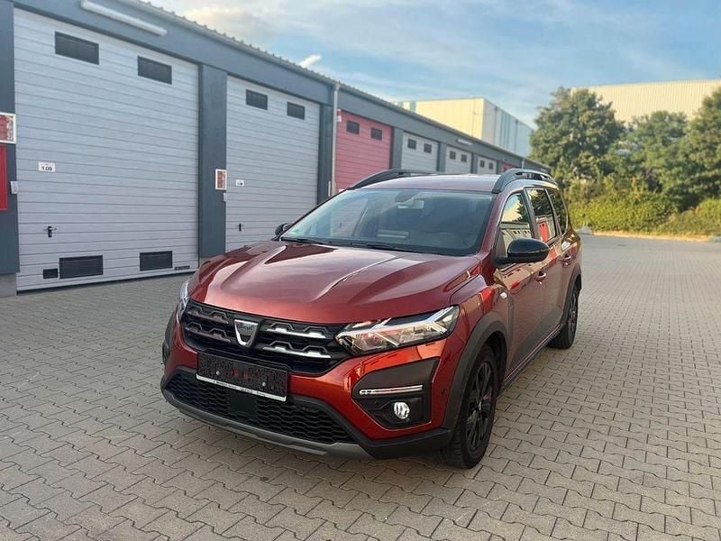Orange Gebraucht 2022 Dacia Jogger Extreme Limousine | 12.999 € - Bild 1/4
