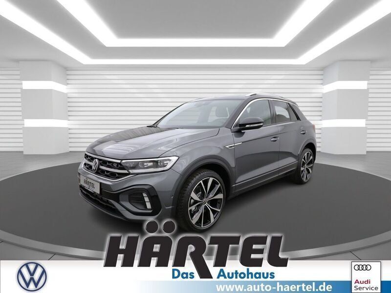Indiumgrau (grey), metallic Neu 2025 VW T-Roc R-line SUV | 38.500 € (Fairer Preis) - Bild 1/4