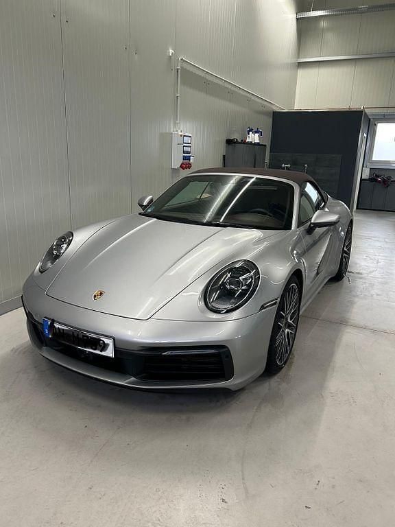 Silber Gebraucht 2024 Porsche 911 Carrera 4S Cabriolet Cabrio | 165.900 € (Teuer) - Bild 1/4