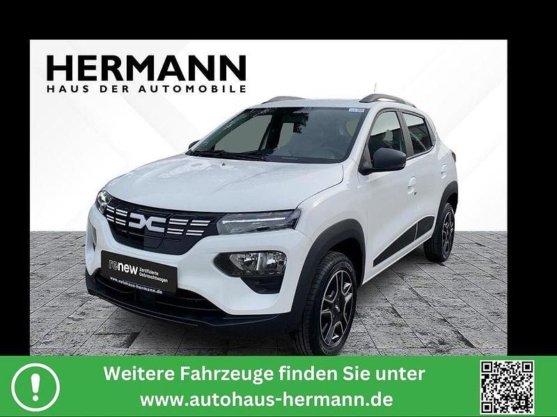 Kaolinweiß (weiß) Gebraucht 2023 Dacia Spring Essentiel Kleinwagen | 13.492 € (Fairer Preis) - Bild 1/4