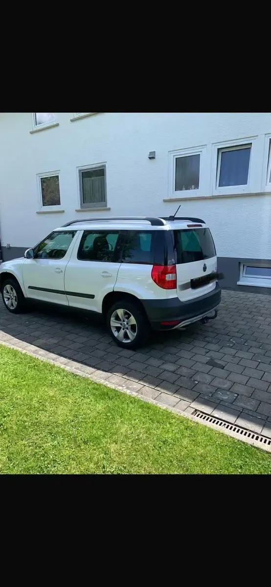 Gebraucht Skoda Yeti 105 PS (77 kW) 2011 Weiß SUV