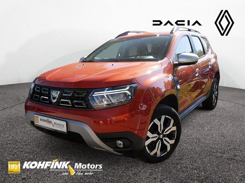Orange (metallic) Gebraucht 2022 Dacia Duster Prestige SUV | 19.680 € (Fairer Preis) - Bild 1/4