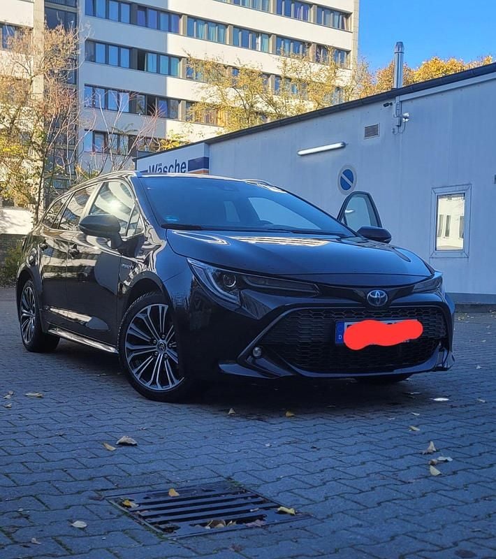 Schwarz Gebraucht 2021 Toyota Corolla Kombi | 18.400 € (Superpreis) - Bild 1/4
