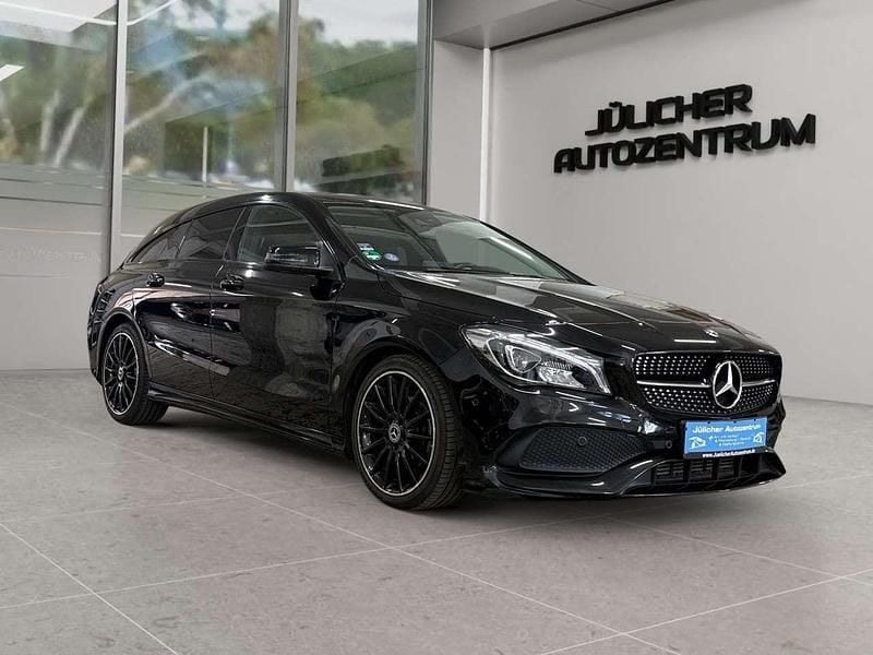 Kosmosschwarz Gebraucht 2019 Mercedes CLA200 AMG line Kombi | 19.490 € (Fairer Preis) - Bild 1/4