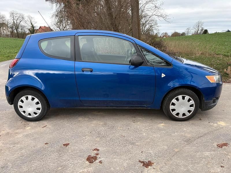 Gebraucht Mitsubishi Colt 75 PS (55 kW) 2010 Blau Kleinwagen