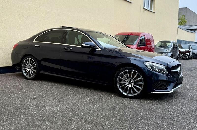 Blau Gebraucht 2014 Mercedes E250 AMG line Limousine | 18.990 € (Teuer) - Bild 1/4