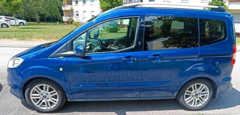 Blau Gebraucht 2016 Ford Tourneo Courier Van / Kleinbus | 8.500 € - Bild 1/4