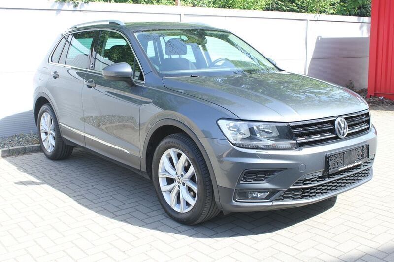 Grau Gebraucht 2018 VW Tiguan Sound SUV | 17.990 € (Guter Preis) - Bild 1/4