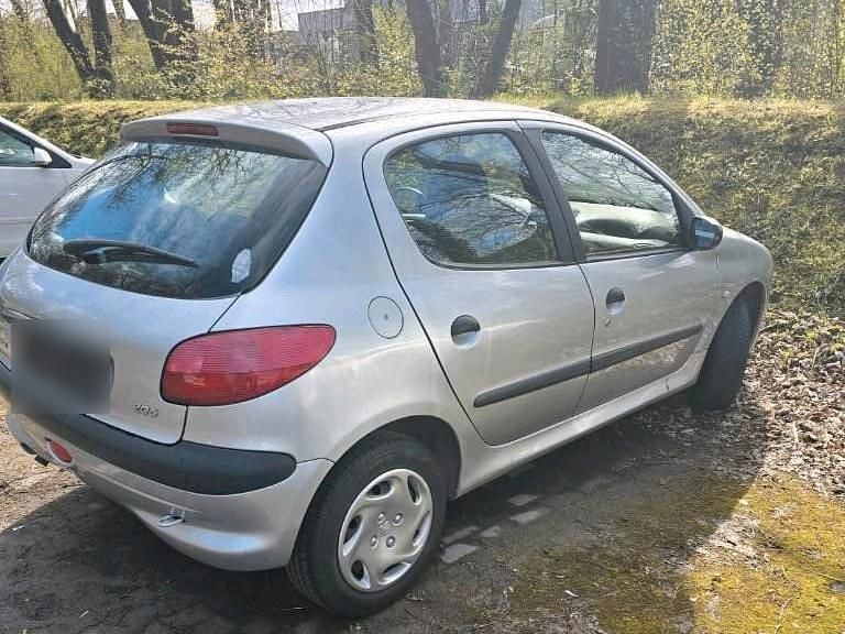 Gebraucht Peugeot 206 75 PS (55 kW) 2003 Silber Kleinwagen