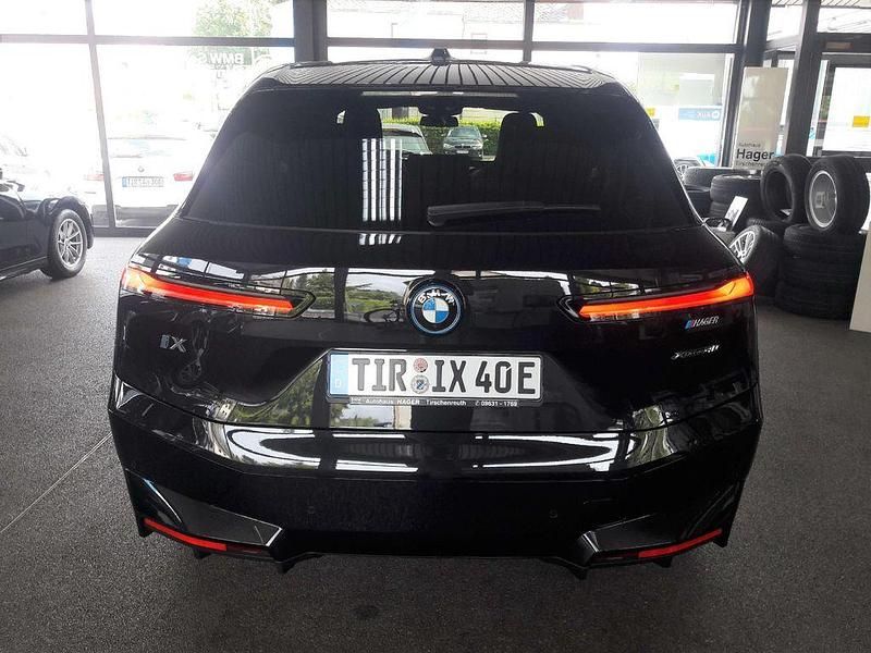 Black sapphire metallic Gebraucht 2022 BMW iX Sport Line SUV | 49.990 € (Fairer Preis) - Bild 1/4