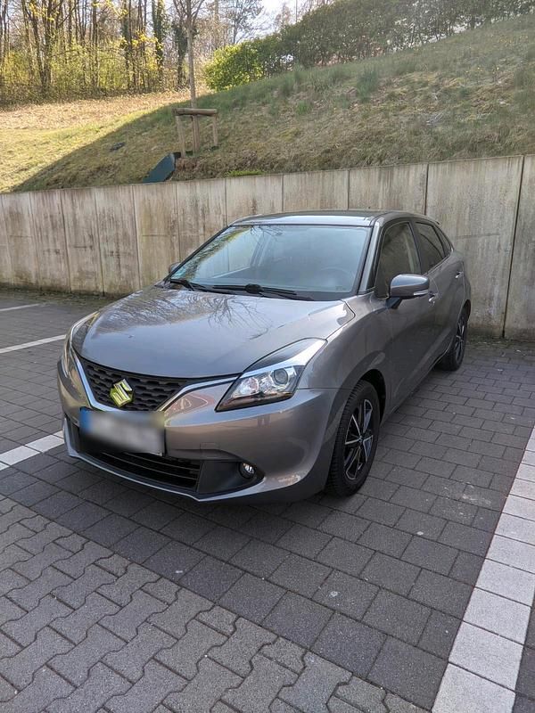 Grau Gebraucht 2017 Suzuki Baleno Kleinwagen | 8.400 € (Fairer Preis) - Bild 1/4