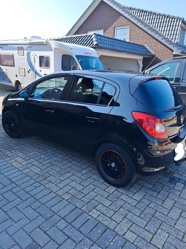 Gebraucht Opel Corsa 101 PS (74 kW) 2011 Schwarz Kleinwagen