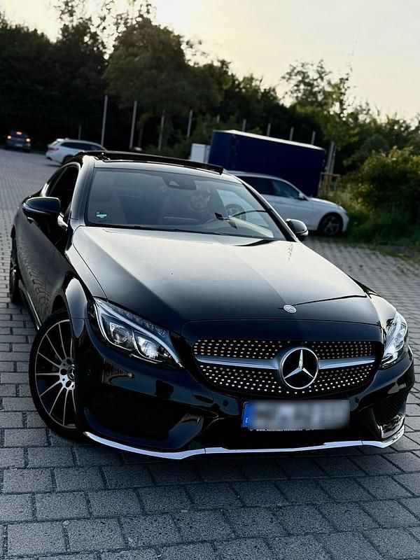 Schwarz Gebraucht 2016 Mercedes C400 AMG line Coupé | 29.999 € (Fairer Preis) - Bild 1/4