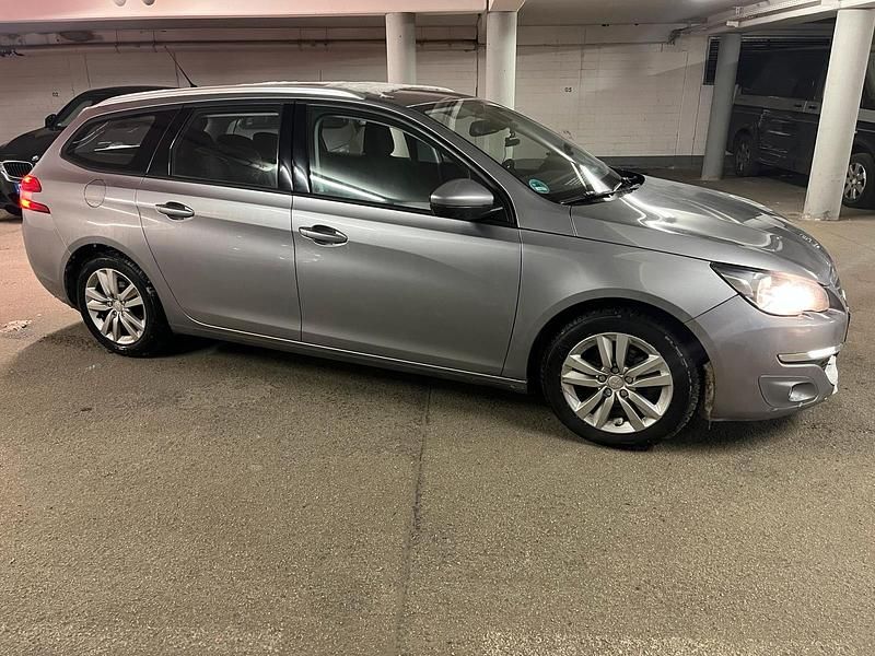 Grau Gebraucht 2014 Peugeot 308 Kombi | 5.200 € (Fairer Preis) - Bild 1/4