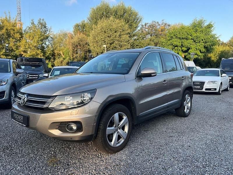 Titanium beige metallic Gebraucht 2012 VW Tiguan Style SUV | 9.590 € - Bild 1/4