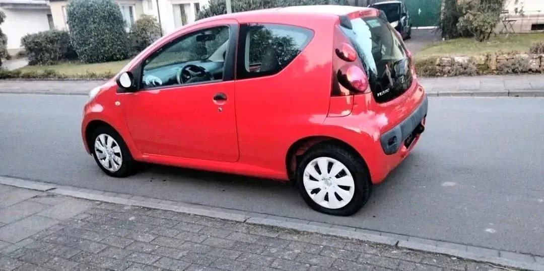 Gebraucht Peugeot 107 68 PS (50 kW) 2012 Rot Kleinwagen