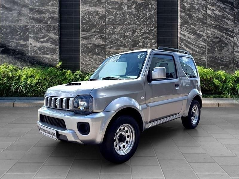 Steel silver Gebraucht 2015 Suzuki Jimny Comfort SUV | 18.590 € (Teuer) - Bild 1/4