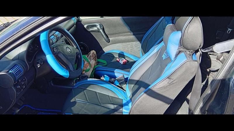 Gebraucht Opel Tigra 106 PS (77 kW) 1998 Schwarz Coupé