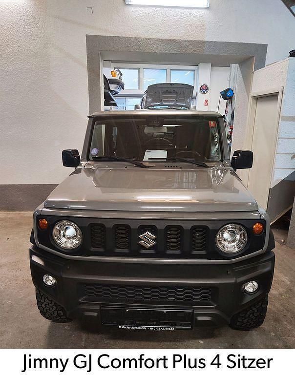 Grau Gebraucht 2019 Suzuki Jimny Comfort+ SUV | 29.390 € (Fairer Preis) - Bild 1/3