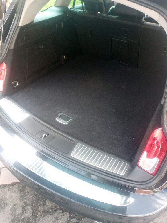 Second-hand Opel Insignia 194 CP (142 kW) 2013 Negru Break