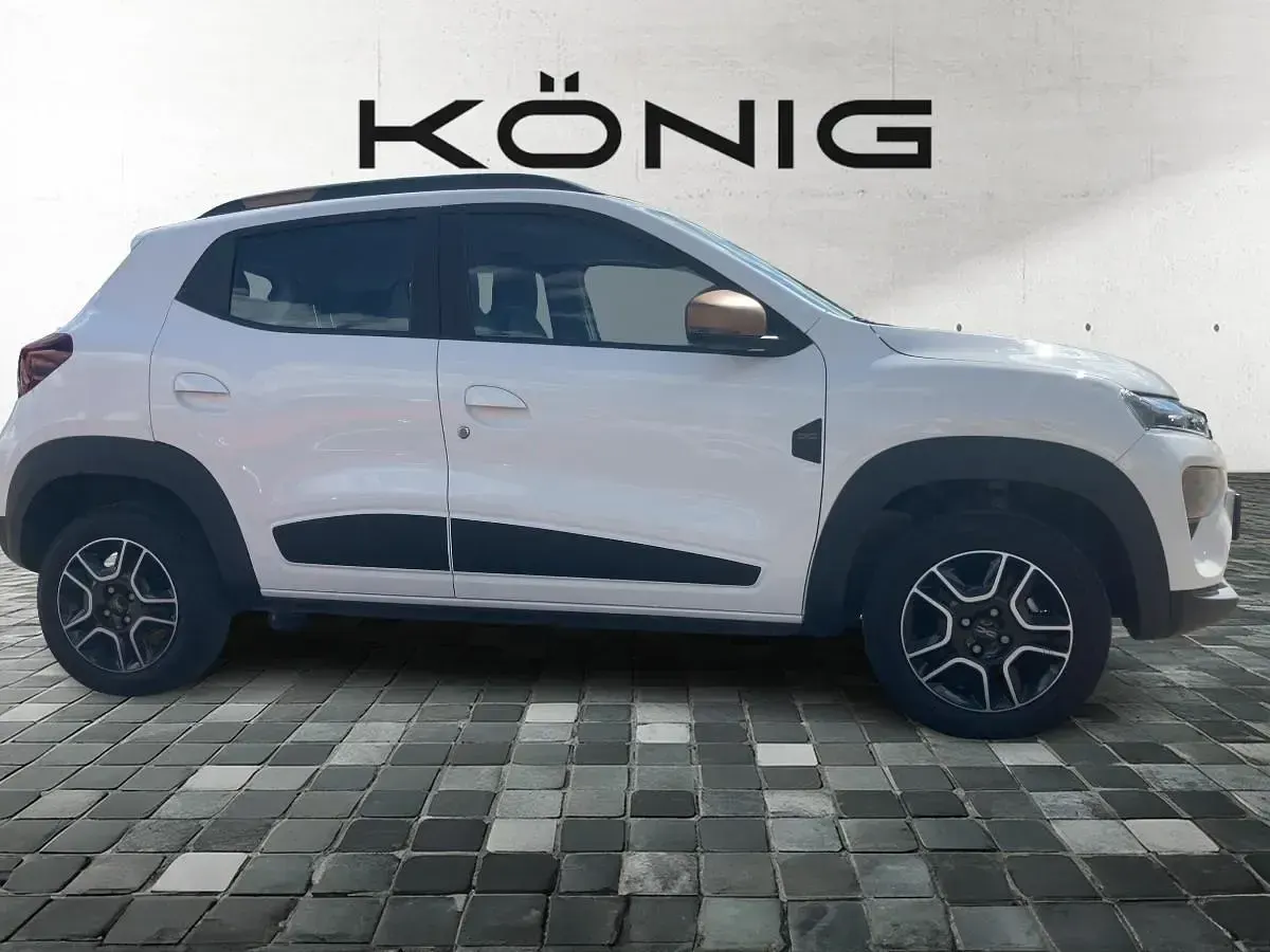 Gebraucht Dacia Spring Extreme 47 kW (65 PS) 2023 Weiß Kleinwagen