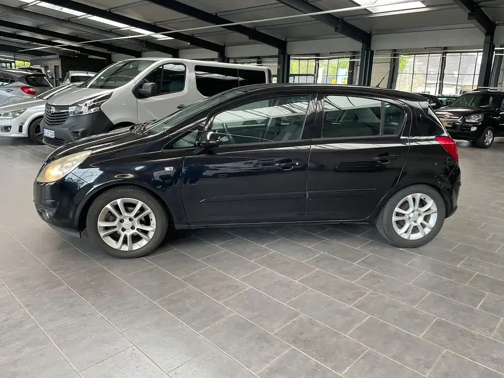 Gebraucht Opel Corsa Sport 80 PS (58 kW) 2007 Saphirschwarz mi2 (metallic) Kleinwagen
