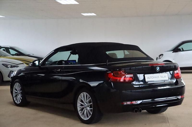 Gebraucht BMW 228 Sport Line 245 PS (180 kW) 2016 Schwarz(metallic) Cabrio