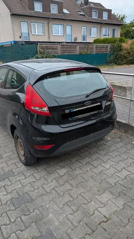 Gebraucht Ford Fiesta 60 PS (44 kW) 2010 Schwarz Limousine
