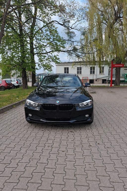 Second-hand BMW 318 143 CP (105 kW) 2014 Negru Break