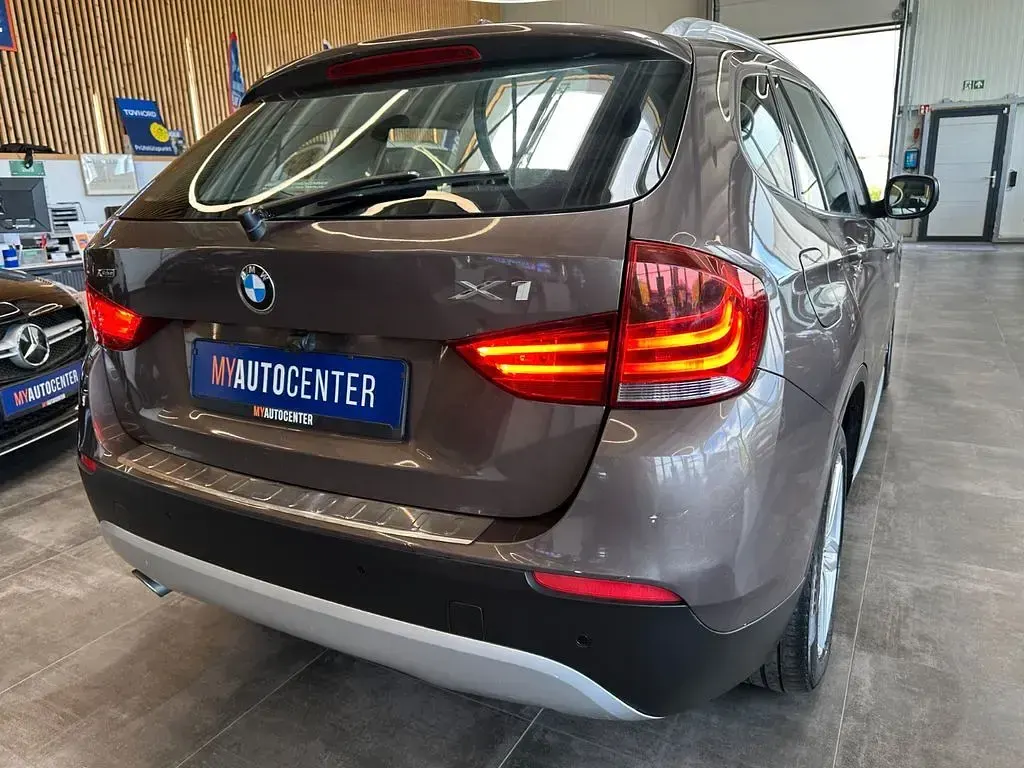 Second-hand BMW X1 143 CP (105 kW) 2012 Maro SUV