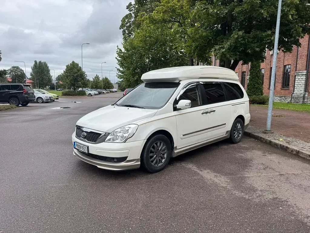 Gebraucht Kia Carnival 197 PS (144 kW) 2010 Weiß Van / Kleinbus