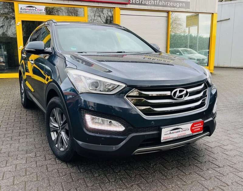 Grau Gebraucht 2016 Hyundai Santa Fe Style SUV | 15.290 € (Superpreis) - Bild 1/4